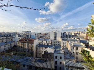 Très bel appartement avec vue sur la Tour Eiffel, grande terrasse, coucher de soleil Parisien