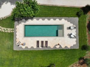Tenuta Fico D India - Luxury Trulli with Swimming Pool