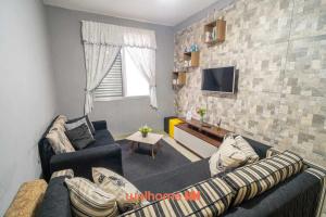 Apartamento na Praia Grande a Passos da Praia