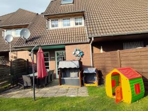 Ferienhaus Möwennest 18, Butjadingen, Tossens, Sauna, Strandkorb, Nordsee, 3 SZ, bis 8 Gäste plus 2 Kleinkinder