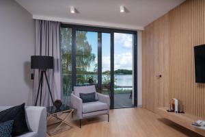 Olimpijska Olsztyn Elite4Rent apartamenty z panoramicznym widokiem na jezioro i przestronnymi tarasami