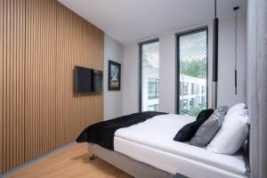 Olimpijska Olsztyn Elite4Rent apartamenty z widokiem na jezioro i przestronnymi tarasami