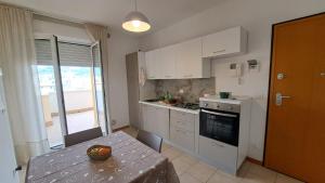 Alloggio con terrazzo e parcheggio privato