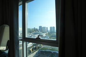 Modern 3BR Stay near Okada with WiFi and Pool Access
