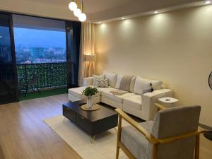 modern living two bedroom apartment with heated swimming pool well equipped gym ample parking space children playing ground and a relaxing rooftop with breathtaking scenic views