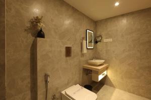 Grand Plaza Inn by RAK Rooms, Kannur