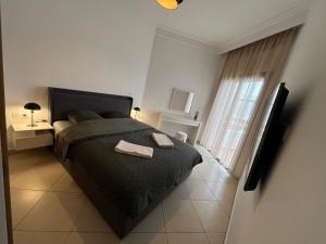 Beachfront Apartment in Assilah, Private Solarium, 4 Pools, Secure Residence, WiFi, Parking