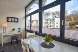 Haus am Meer, Wintergarten-App 5, 1 SZ, strandnah by Unsere Urlaubszeit