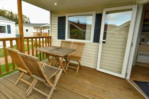 Ferienpark AM WALDRAND - Mobilheim Pacifique für 4 Personen - Flutsaum