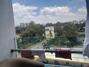 The comfort executive loft three bedroom apartment with amazing breathtaking city views , swimming pool ,gym ,private ample parking space with designated child playground area