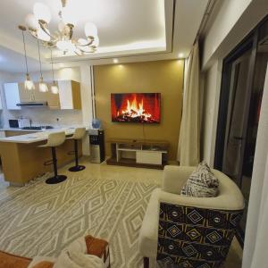 Enzi 1br, Gym, Pool, city views, near Jkia