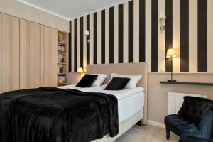 Eleganckie Studio na Wyspie Spichrzów z Balkonem w Gdańsku by Noclegi Renters