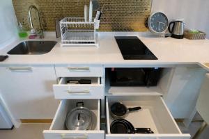 Bright Modern 1BR Condo Near Central Phuket with Pool Gym and Cinema