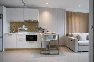 Bright Modern 1BR Condo Near Central Phuket with Pool Gym and Cinema