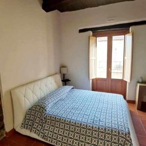 Alloggio con Giardino, Wi-Fi e Aria Condizionata