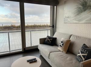 Waves of Westende - a studio with a sea view