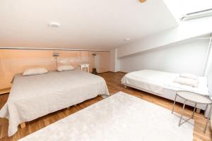 2ndhomes Bright & Spacious 2-Story Apartment with Sauna