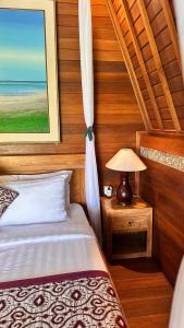 Wooden pool villa in ubud By iLys Collection