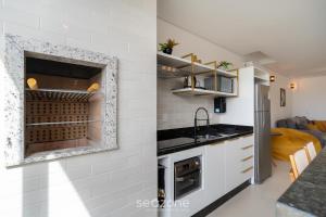 Aptos em cond. c piscina a apenas 500 m da Praia dos Ingleses - MNCs