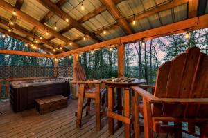 Private Wooded Cabin w Hot Tub, Fire Pit & Arcade