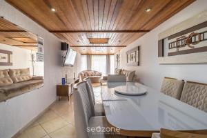 Apto c área de churrasco no Portinho CFN0847