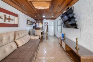 Apto c área de churrasco no Portinho CFN0847