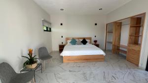 Chalchitepetl hab en Casa Carolina