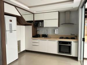 Apartamento duplex na praia dos milionários