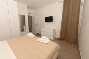 casa per vacanze PONENTE APARTMENT LEONARDO AIRPORT