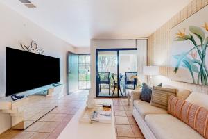 Snowbirdfriendly retreat with pool hot tub tennis putting green patio