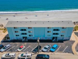 A18 Parrot Escape - OCEAN VIEW! There is nothing quite like a Carolina sunrise viewed from your private oceanfront deck condo
