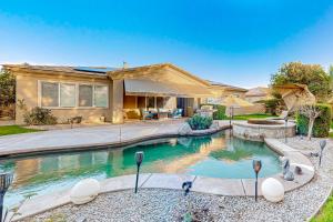 Luxury home with an enclosed yard pool pool spa