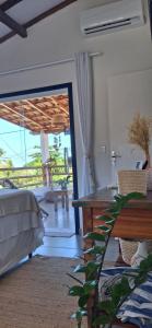 Apartamento em Cumuruxatiba a 50m da praia