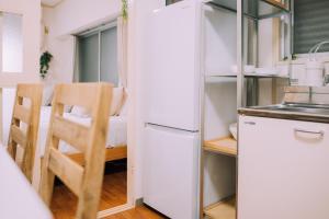 Bright & Convenient 1BR in Hakata, Steps from STN