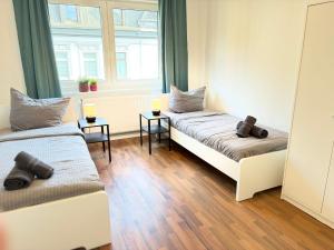 CosyHomes24 - Centrally with parking space, living room and balcony - GE11c