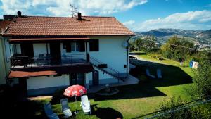 Camera Nest con vista giardino