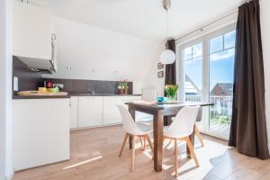 Ostseegarten Langholz - Ferienwohnung Waterblick bis 4 Pers