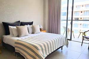Frente al Mar | 2 Suites | Salida Directa a Playa