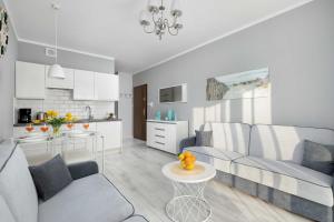 Functional Family Apartment in the City Center with Balcony by Noclegi Renters