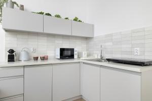 Jasne Studio Blisko Zamku na Wawelu w Krakowie by Noclegi Renters