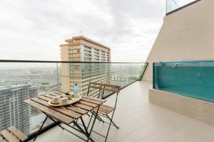 Colorful Designer 1BR Apartment with Pool - JVC