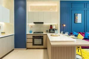 Colorful Designer 1BR Apartment with Pool - JVC