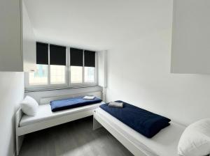 L21-Apartment Dortmund, 2 Zimmer, 4 Betten, Standardisierte Ausstattung, ideal für Reisende, Pendler, Familien