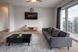 Designer UAB Condo King Bed Balcony View