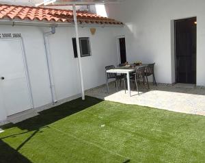 Casa con patio a 5 min de la playa - El Palo