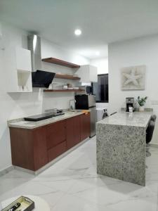 New Two-Bedroom Apartment with a Rooftop Pool, Minutes from the Beach