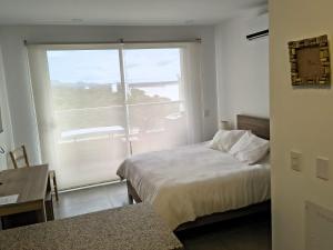 Bello Apartasuite con Piscinas y Vista al Mar, Piso 10