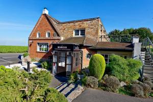 Hotels Le Manoir : photos des chambres