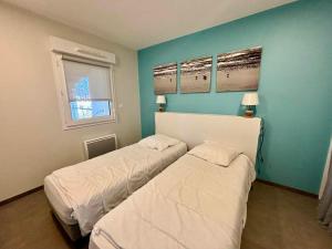 Appartement 2 chambres, balcon, piscine chauffée, accès plage, animaux admis, parking - FR-1-194-194