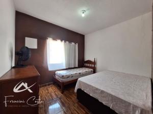 Casa com piscina no Indaiá em Bertioga - Para 8 pessoas